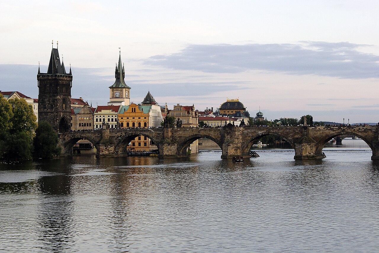 Charles Bridge lined with baroque statues over the Vltava